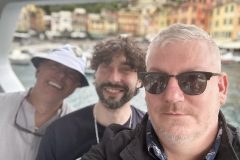 Barrie Jarrett and Mark Stafford with Pedro in Portofino, Italy harbour